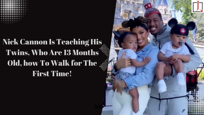 Nick Cannon is teaching his twins, who are 13 months old, how to walk for the first time.