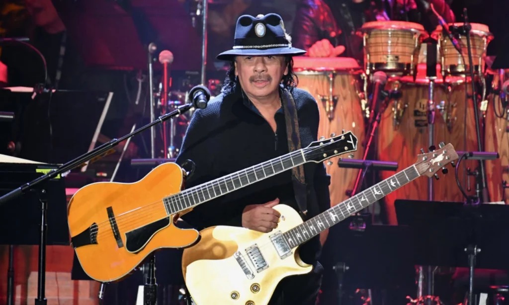 Carlos Santana has postponed six shows after an onstage collapse.
