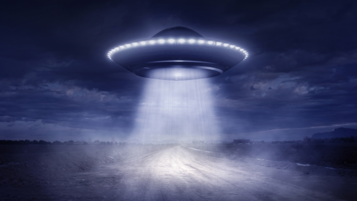 A Person in New Jersey Says a Disc-Shaped UFO Flew Over His Head!